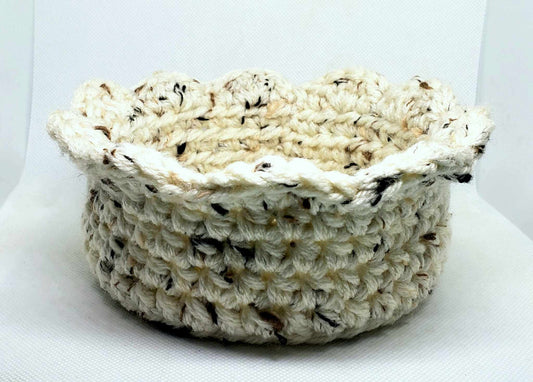 Side of empty coaster basket