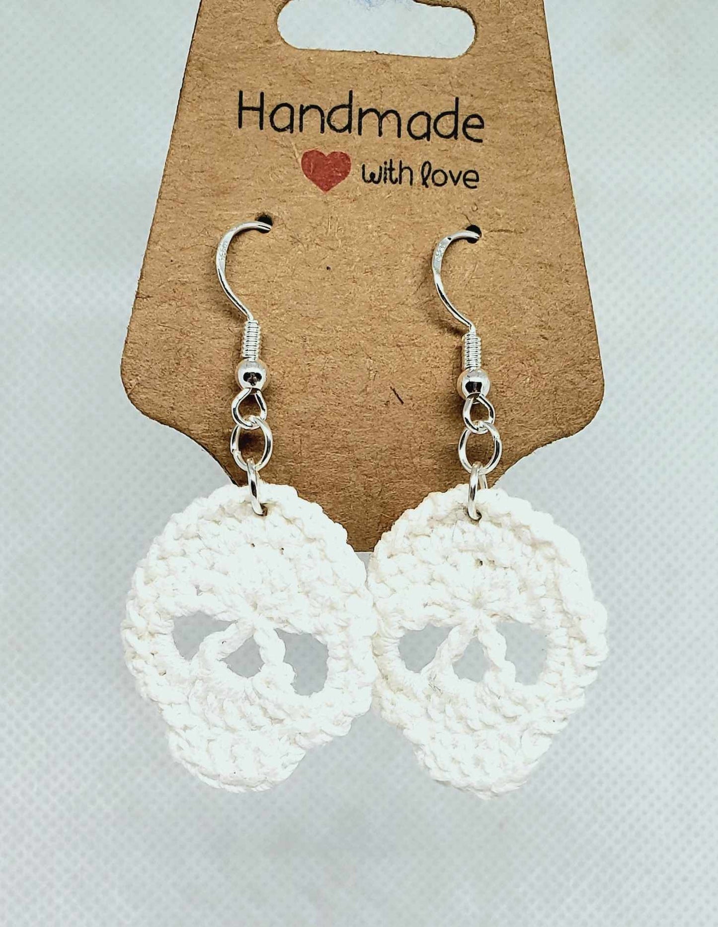 small white skull earrings