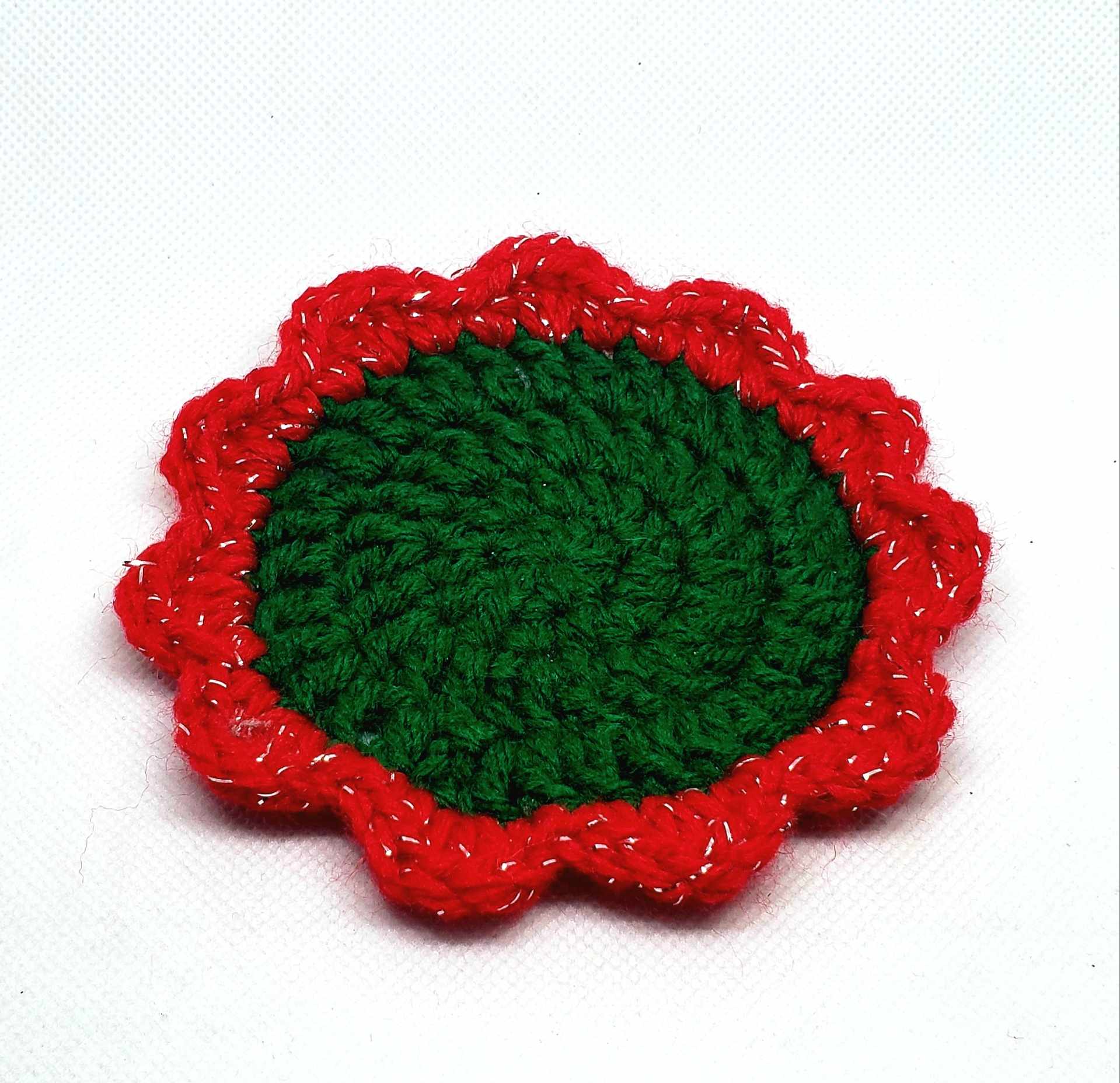 single green and red sparkle coaster