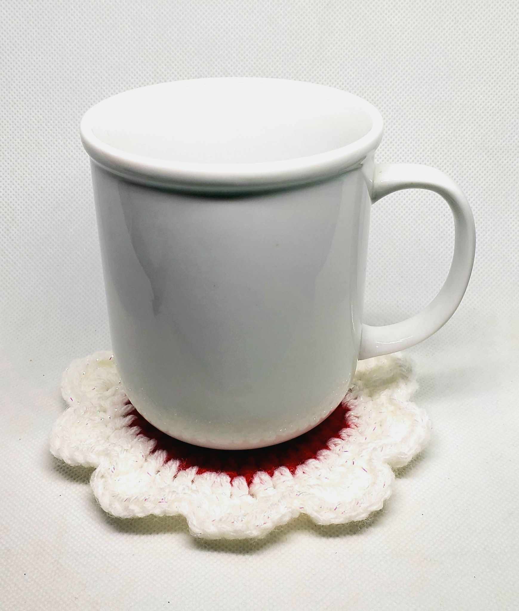 10 inch china mug on single red and white sparkle coaster